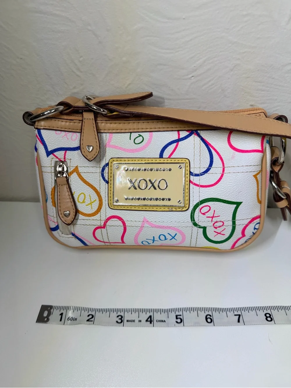 XOXO White Multicolor Heart Print Wristlet with Tan Trim